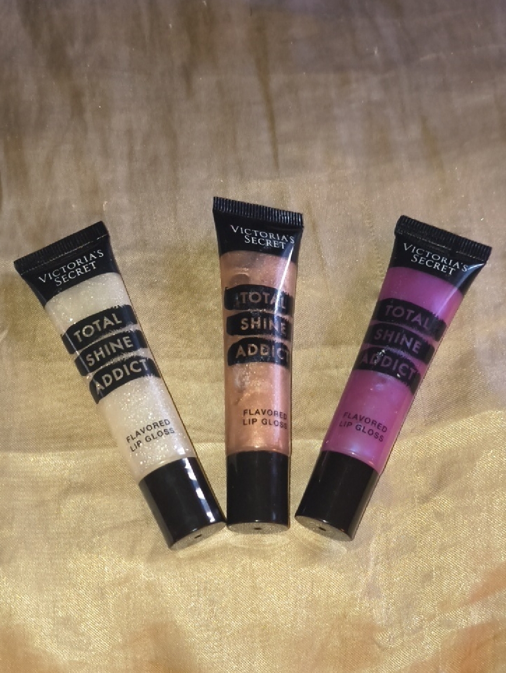 Victoria's Secret Lip Gloss Trio in Gold, Bronze, Pink